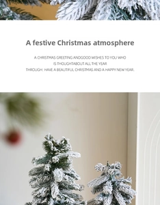 Detail of mini flocked Christmas trees with artificial snow for festive table decoration