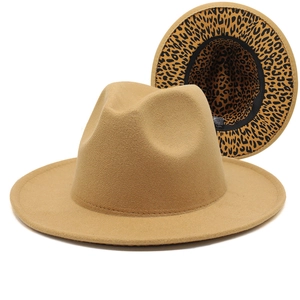 Close-up of camel fedora hat featuring stylish leopard print lining and inner detail