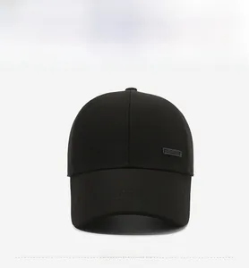 Detail view of classic black baseball cap with premium metal side plate and twill fabric