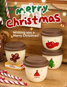 Detailed view of four mini ceramic Christmas cups with festive patterns and brown lids
