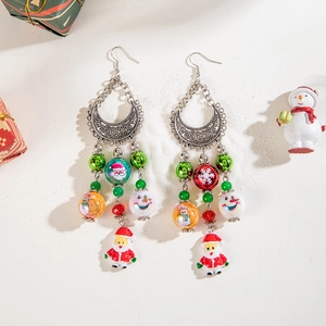 Ethnic beaded Christmas earrings with Santa Claus pendants and festive snowflake beads