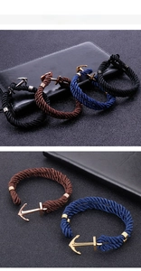 Detail showing woven nylon rope bracelets with stainless steel anchor clasps in various colors