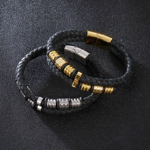 Mens multi-layer braided leather bracelet with magnetic metal clasp and steel accents
