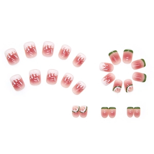 Pink gradient summer fruit press-on nails with lemon and watermelon designs in a full set