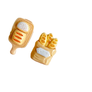 Resin bread slices and baguette models on white background for DIY crafts