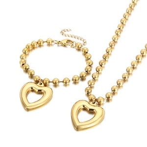 Fashionable gold beaded chain jewelry set with hollow heart pendant and lobster clasp