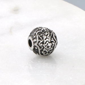 Vintage roestvrijstalen afstandskraal met reliëfpatronen voor herenarmbanden