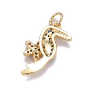 Detail of a gold leopard pendant with blue and purple cubic zirconia inlays