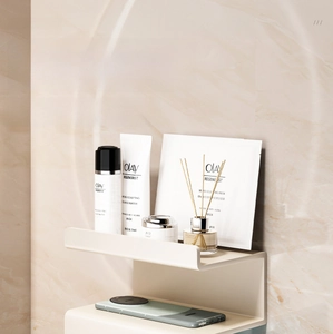 Macro view of wide white wall-mounted storage shelf with minimalist L-shaped design