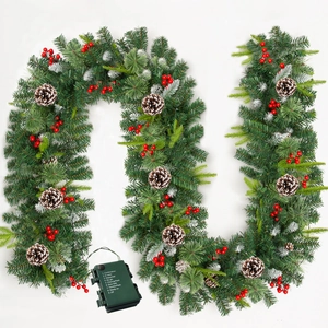 Detailed close-up of 9FT Christmas garland with green pine needles, red berries and pine cones