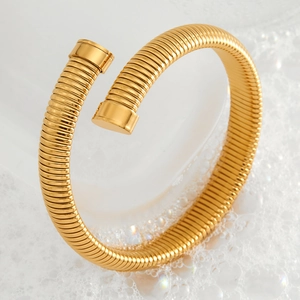 Minimalist gold spiral spring open cuff bracelet in polished stainless steel for women