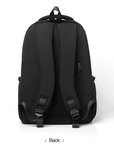 Detailed back view of black nylon school backpack with padded straps and anti-theft zipper