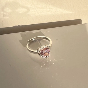 Elegant silver open ring featuring a large pink heart gemstone and clear round crystal
