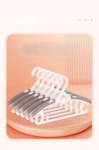 Close-up of retractable hangers with anti-slip rubber and space-saving hooks