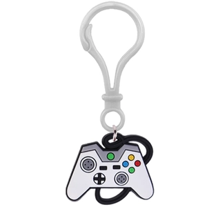 Detail of white PVC game controller keychain with colorful buttons and plastic hook