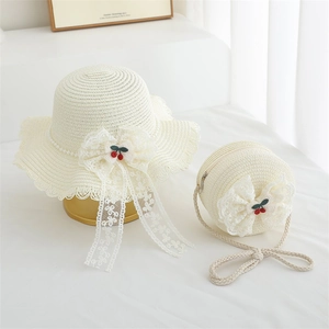 Girl's summer straw hat and matching bag set with lace bow and cherry accents