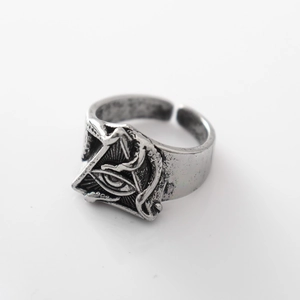 Detailed view of the vintage silver octopus ring with the embossed all-seeing eye design