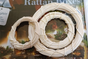 Detailed close-up of three DIY cream-white Indonesian rattan wreaths in various sizes