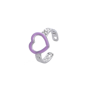 Detailed macro view of an adjustable silver ring featuring a purple enamel heart design