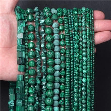 Macro view of various malachite beads including round and square shapes for DIY jewelry