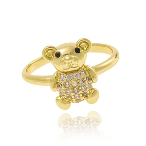 Detailed view of an 18K gold teddy bear ring with sparkling cubic zirconia on white background