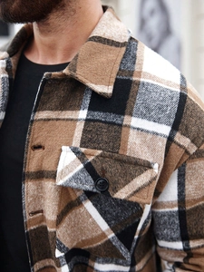 Close-up of the collar and flap pockets on a brown plaid wool blend shacket for men