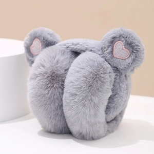 Detailed view of grey plush earmuffs with heart embroidery and cute animal ears design