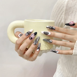 Handmade stiletto press-on nails with 3D pink spider and punk gothic web patterns