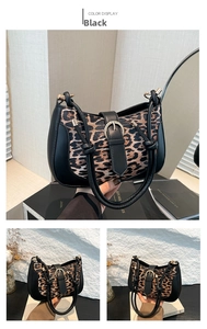Detail of trendy leopard print shoulder bag with black leather and round metal buckle