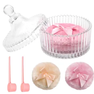 Plush powder puffs with bows and glass storage jar set including two pink scoopers