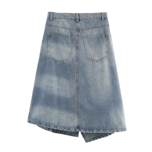 Detail of blue denim midi skirt with back pockets and a stylish irregular hemline