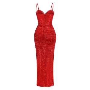 Detail view of red sequin dress showing ruching technique and heart cut-out back design