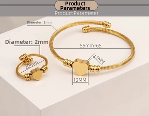 Macro detail of gold heart bangle and ring set with precise size measurements