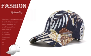 Detail view of tropical leaf print baseball cap with high-quality canvas stitching details