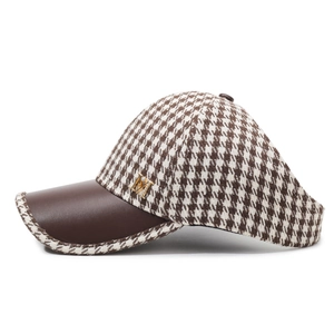 Classic houndstooth baseball cap with brown leather brim and gold metal M logo