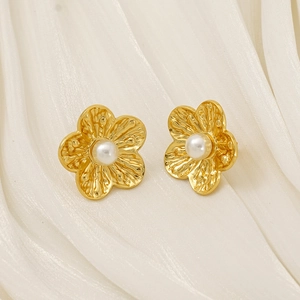 Elegant gold flower pearl earrings for women with detailed petal texture and white pearl