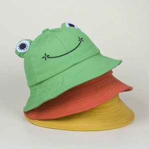 Detail of three embroidered frog bucket hats in green orange and yellow colors