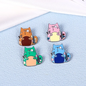 Set of four cute cartoon cat enamel pins in orange, pink, green, and blue metal finish