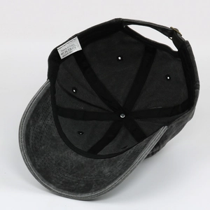 Detail of internal 100% cotton tag and adjustable metal buckle on vintage baseball cap