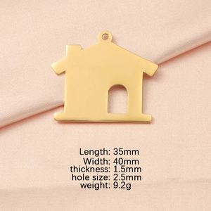 Detail view of 35mm gold hollow house pendant with size 35x40mm and 2.5mm hole specs