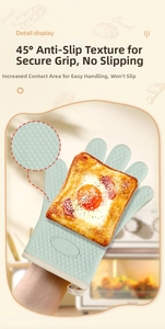 Close-up of heart-shaped silicone texture on heat-resistant oven mitt for secure grip