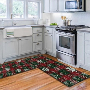 Christmas flannel absorbent mat set with red and green plaid and snowflake patterns