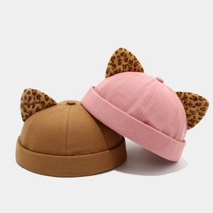 Retro docker hat set in brown and pink featuring leopard print cat ears detail