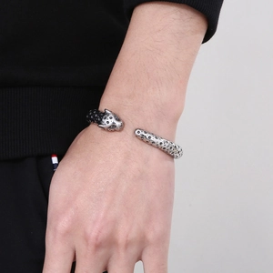 Men's punk leopard head open bangle in silver and black stainless steel finish