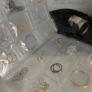 Transparent PVC jewelry storage bag with multiple slots for earrings and necklaces