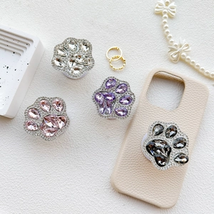 Luxury rhinestone cat paw phone grip stands in pink, purple, white and grey colors