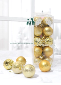 Close-up of gold Christmas ball ornaments with matte, glitter and mesh textures