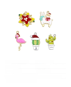 Detail of Christmas enamel alloy charms including Santa on llama and festive cactus for DIY