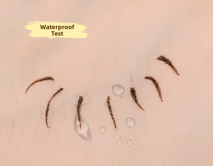 Waterproof test of ultra-fine eyebrow tattoo sticker showing smudge-proof brown hair strokes