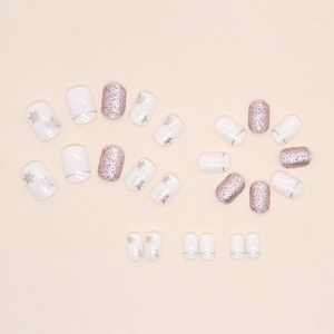 Short square press-on nails with white snowflakes and glitter for winter style